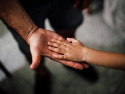 Father and child s hands together