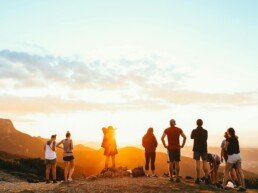 Group of friends watching the sunset