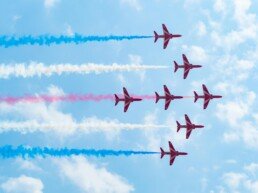 Red arrows flying on sky